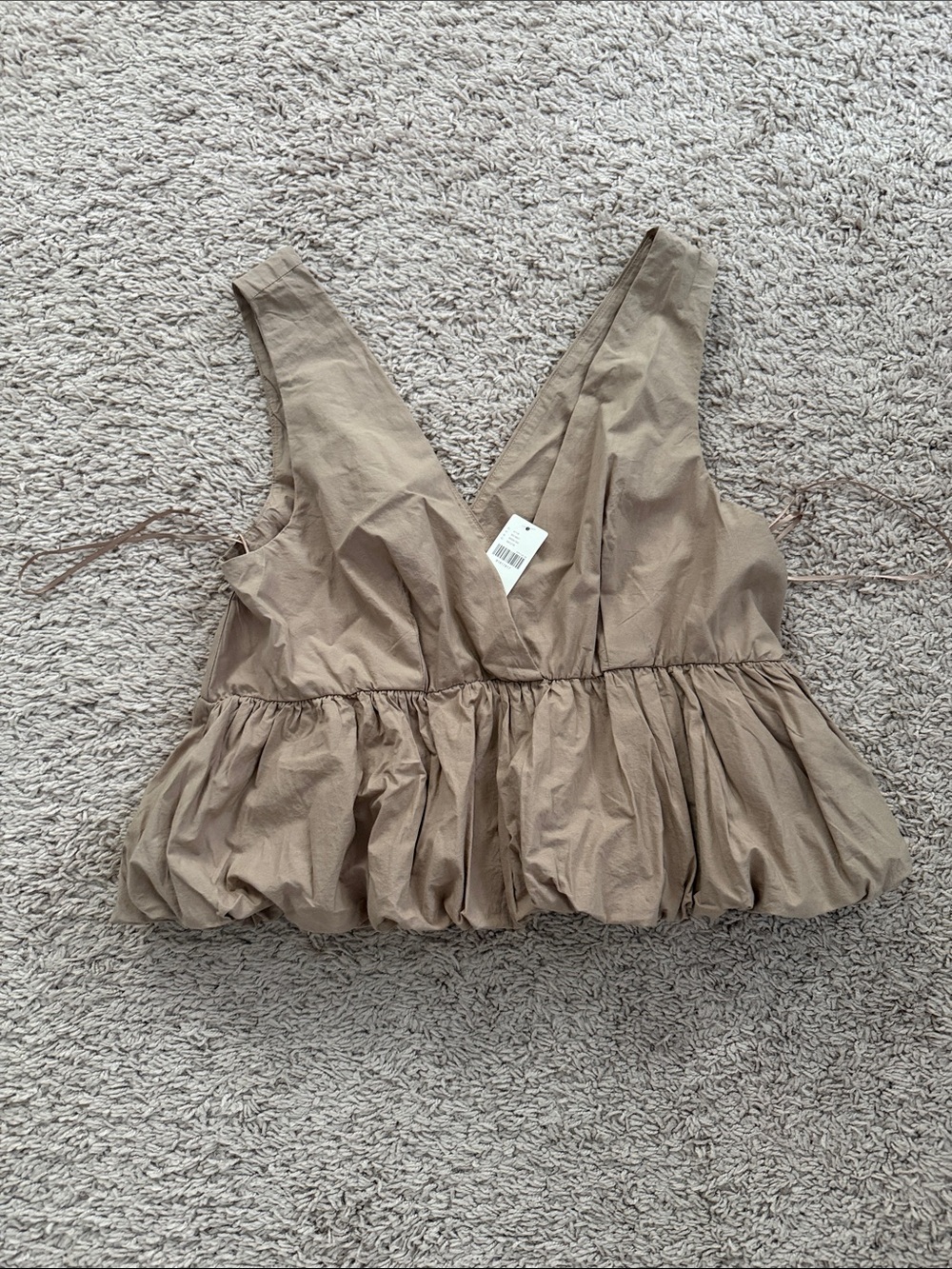 Maeve Peplum V-Neck Top in Taupe
